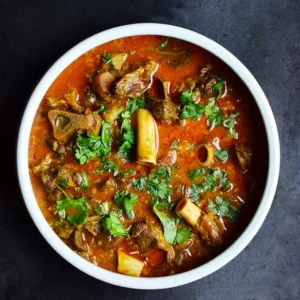 Thakali Thali Explained: Why This Traditional Nepalese Meal Is So Balanced 3 nepali Goat Curry in australia served by mul chowk kitchen
