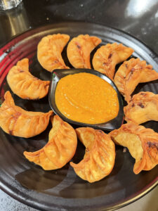 Authentic Handmade Nepalese Momos 17 fried nepali momos served by nepali restaurant